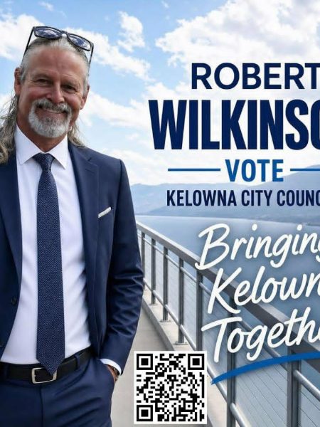 Campaign poster of Robert Wilkinson in a navy suit and tie with sunglasses on his head, standing at a railing above Okanagan Lake, with the slogan "Bringing Kelowna Together" and a QR code